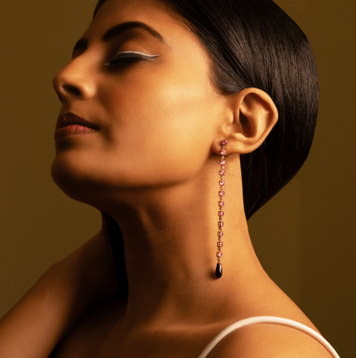Model wearing Website-8 diamond drop earrings